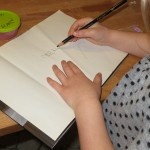 Ellen staver og skriver